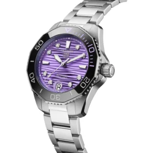 TAG Heuer Aquaracer Professional 300 36mm Ladies Watch Purple MPN: WBP231M.BA0618Elegant and resilient, the TAG Heuer Aquaracer Professional 300 Date pairs a purple wavy-patterned dial with diamond indexes. This high-performance dive watch, water-resistant to 300 meters and featuring a versatile steel 3-row bracelet, seamlessly blends refined style with the grit needed to conquer ocean depths.